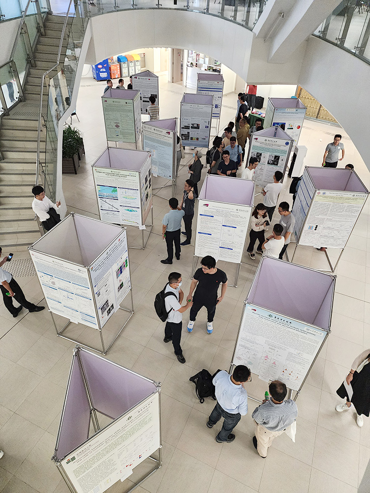Scholars shared knowledge and research progress through poster presentations at the Symposium.